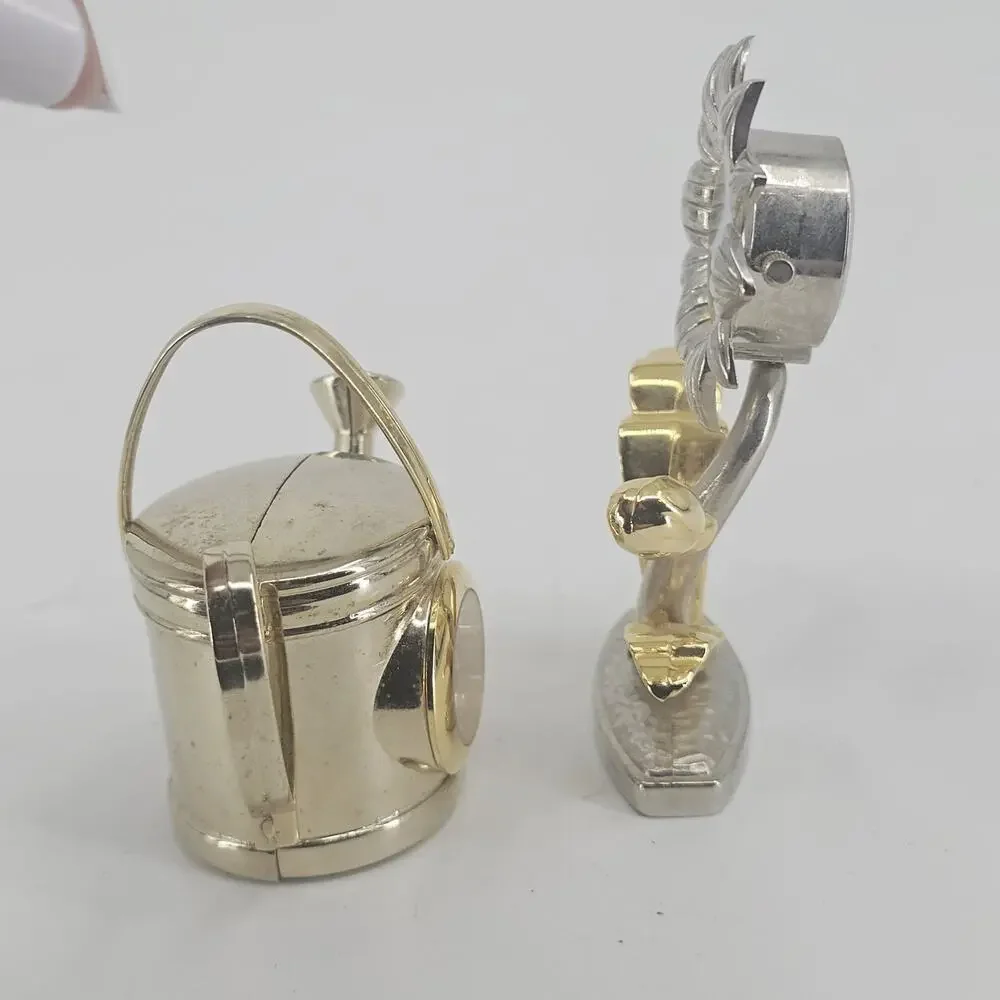 2 SMALL QUARTZ CLOCKS FLOWER & WATER CAN NEED BATTERIES Goldtone Metal Vintage